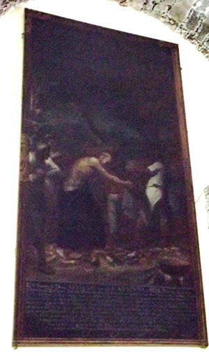 La pintura muestra al Padre Roa caminando sobre brasas. Foto: Alejandro García